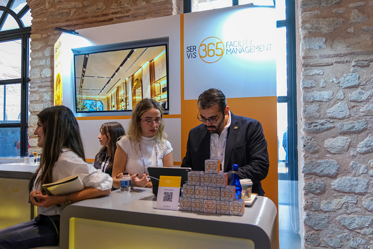 Visitors at the Servis365 booth